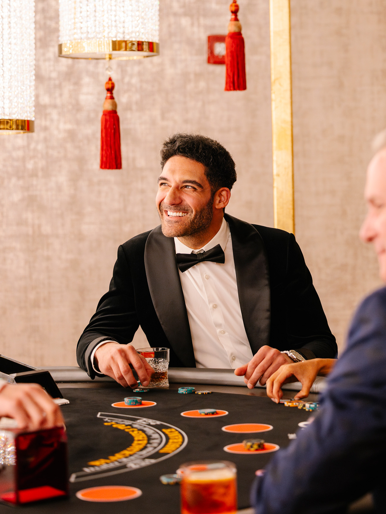 man at a blackjack table in a casino
