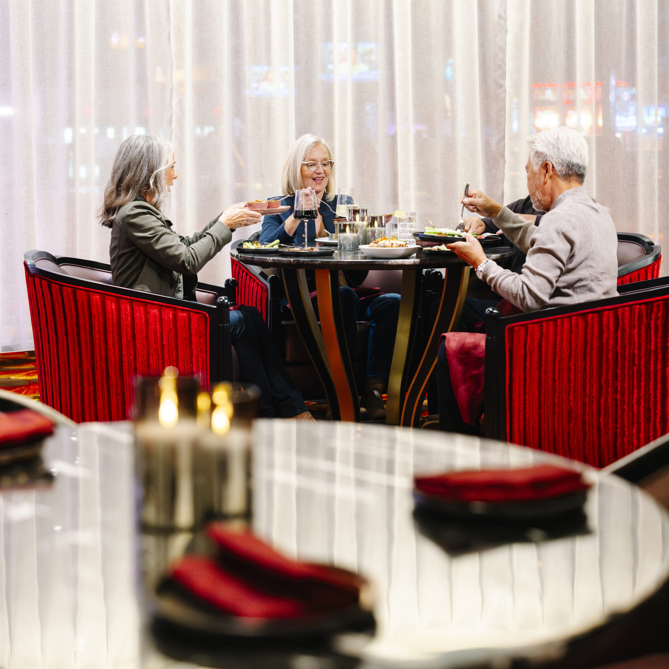 people eating dinner at a table